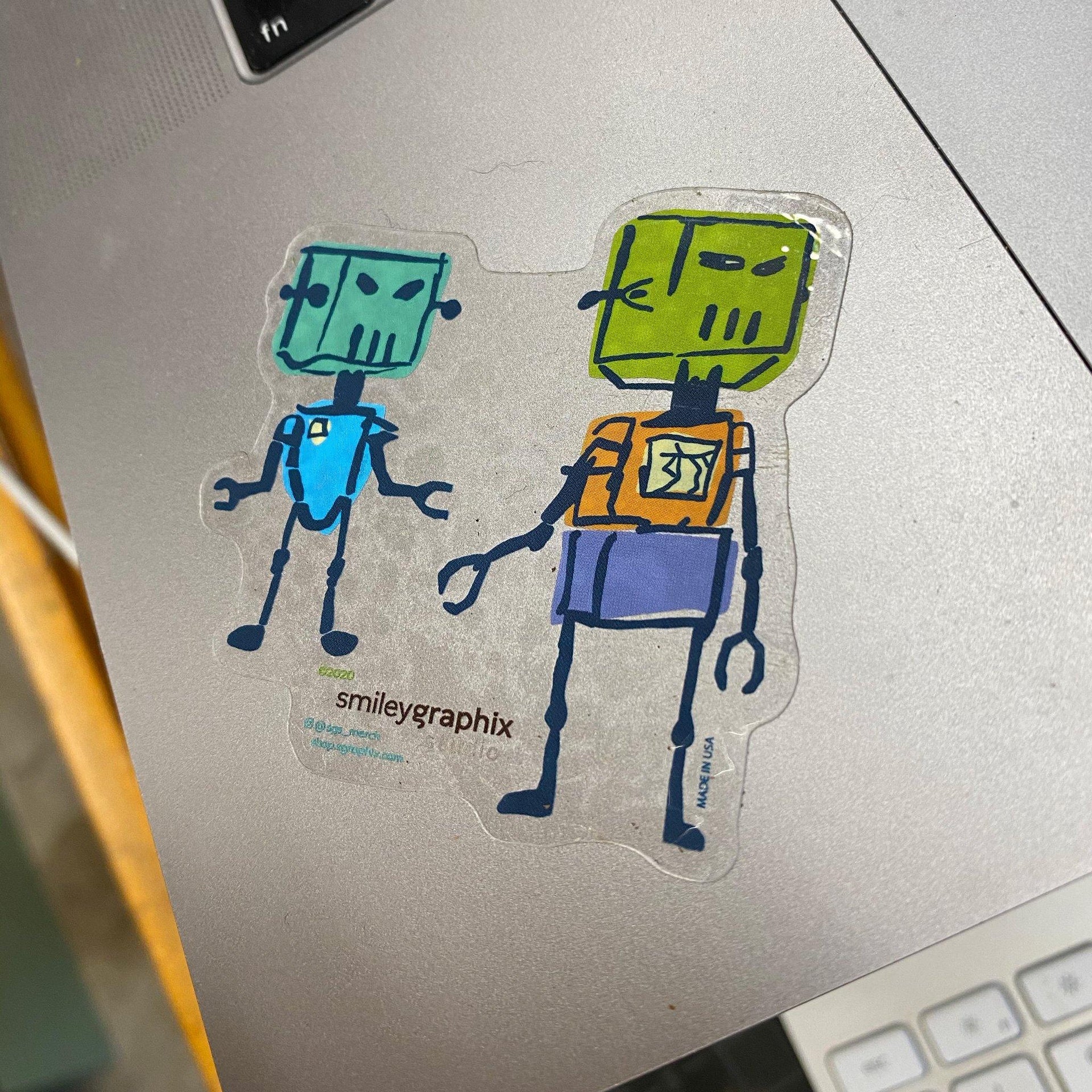 Robots Sticker on Laptop